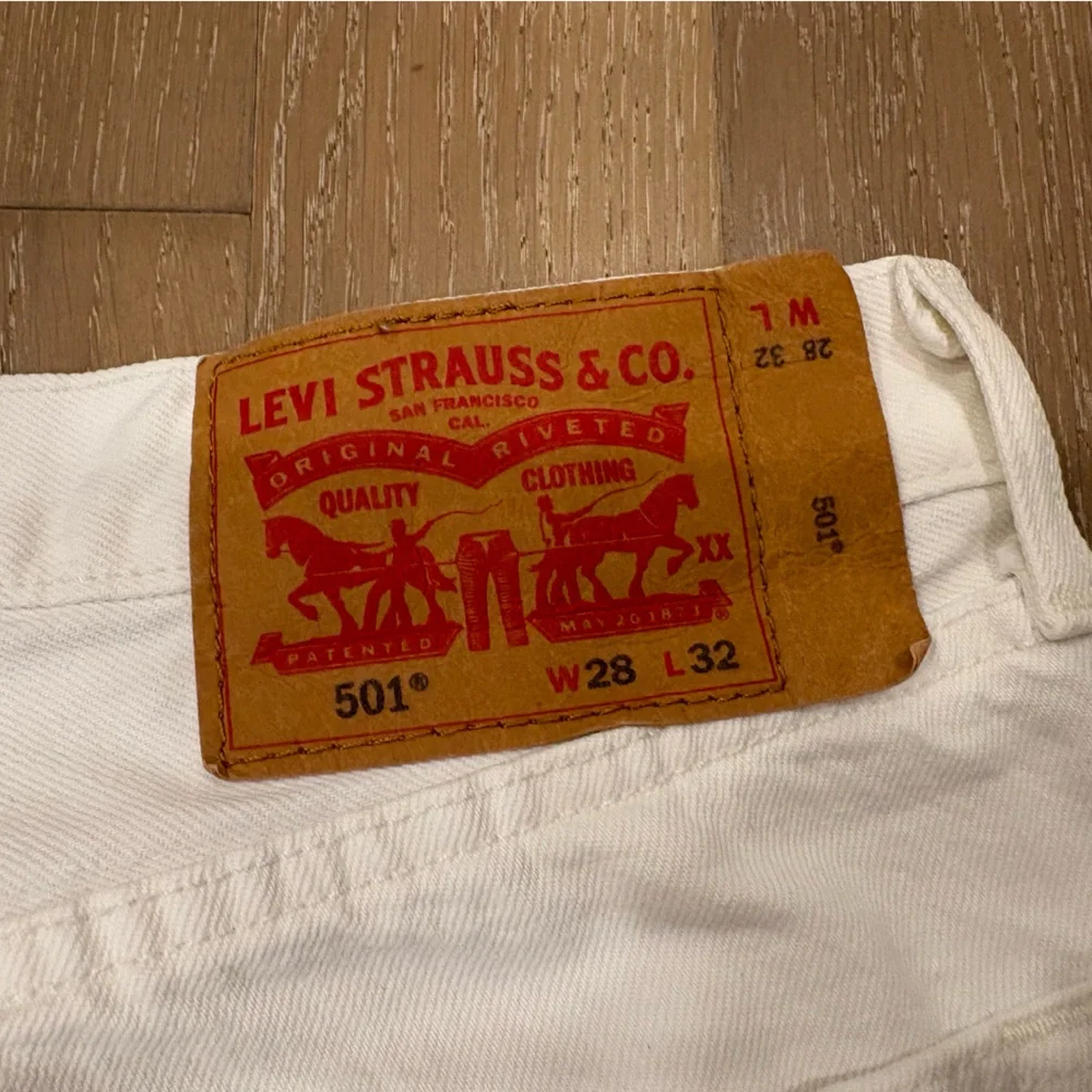 Levi’s 501 white jeans